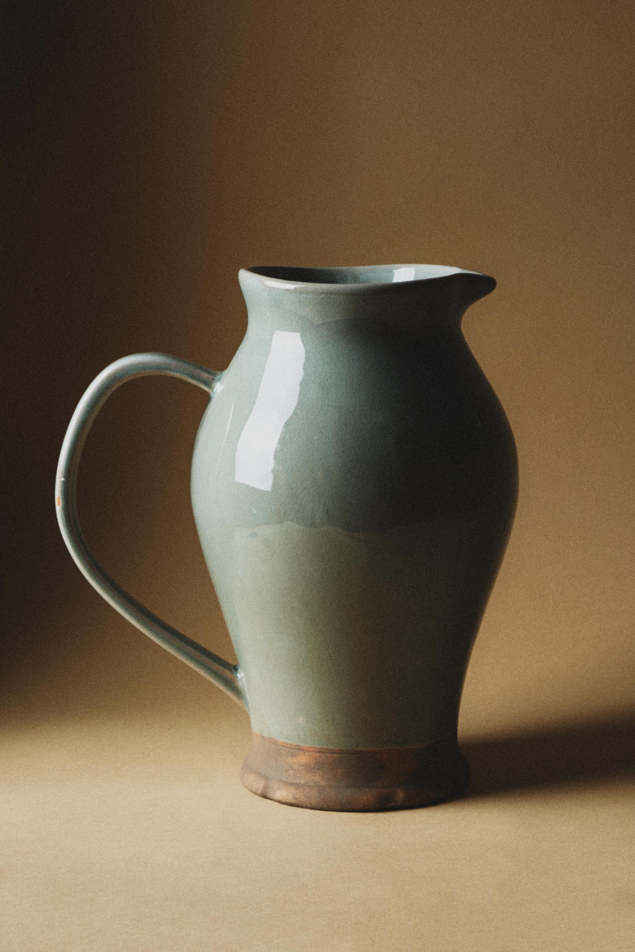 GREENISH CERAMIC VASE